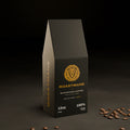 Roastmane Mushroom Coffee 12 oz box, front view, on dark slate with coffee beans
