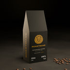 Roastmane Mushroom Coffee 12 oz box, front view, on dark slate with coffee beans